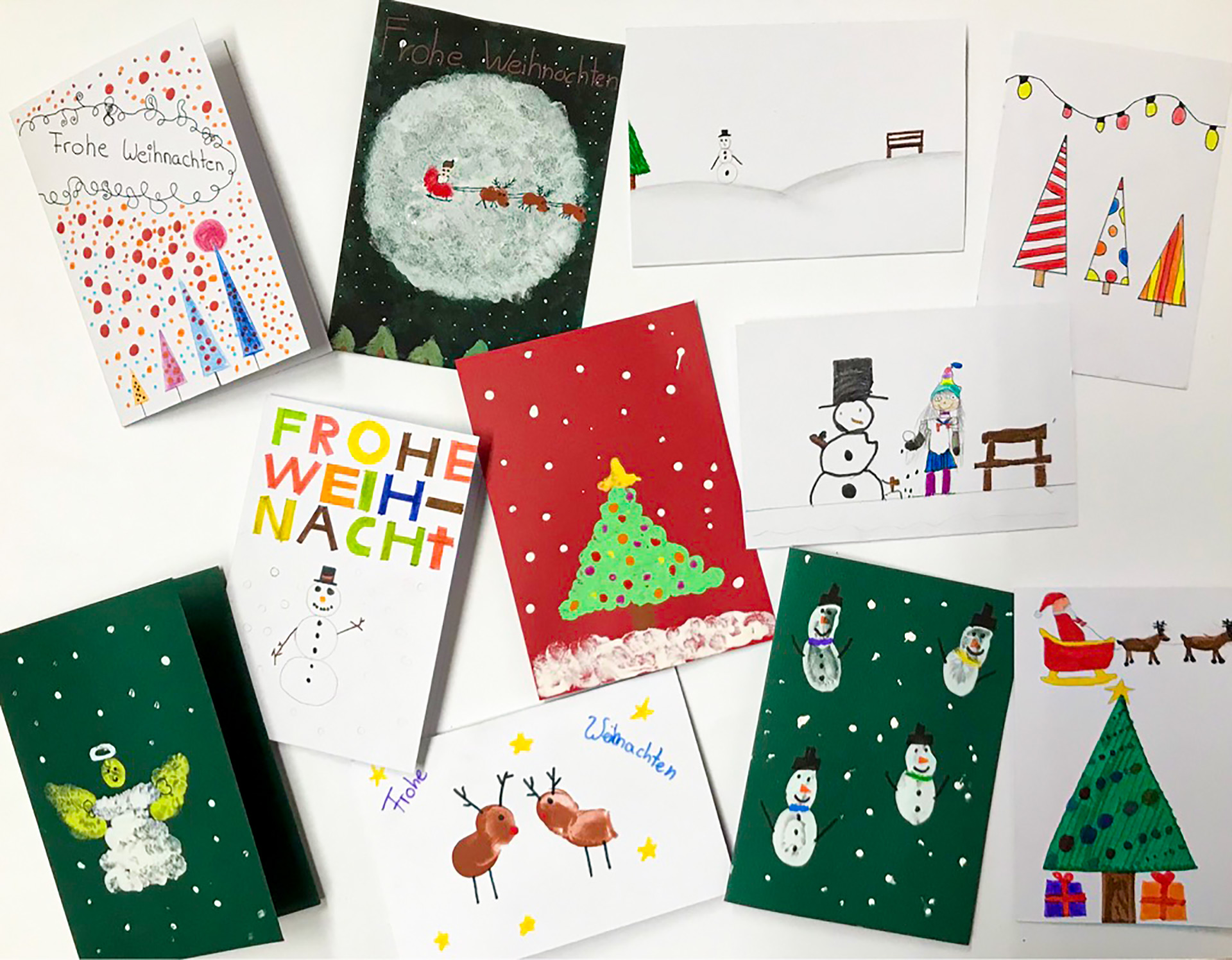 Weihnachtskarten mit selbstgezeichneten Motiven
